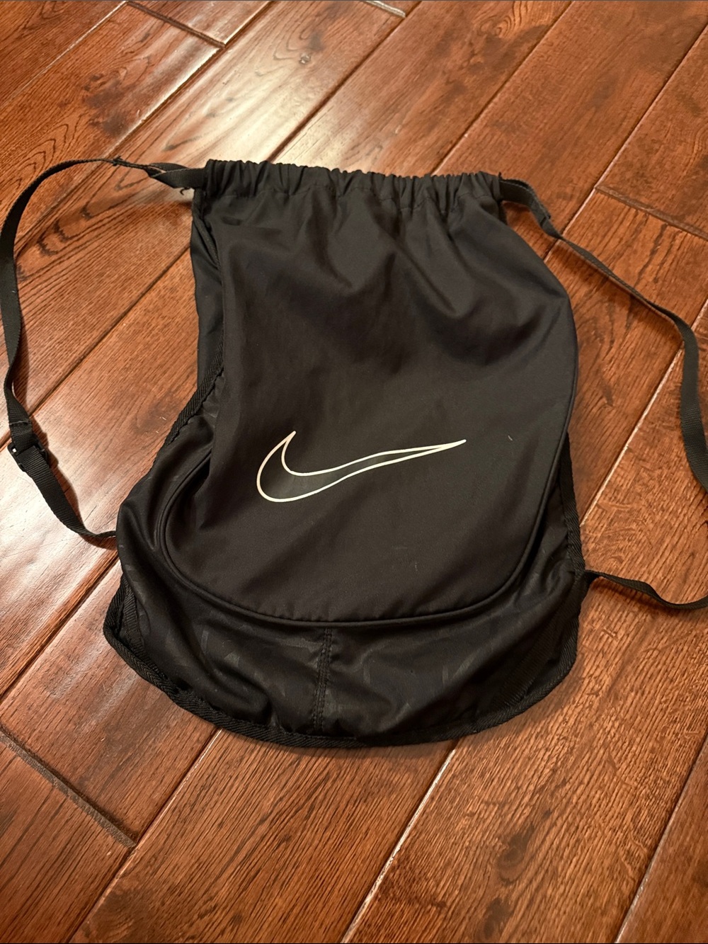 Nike Black Drawstring Backpack with White Swoosh